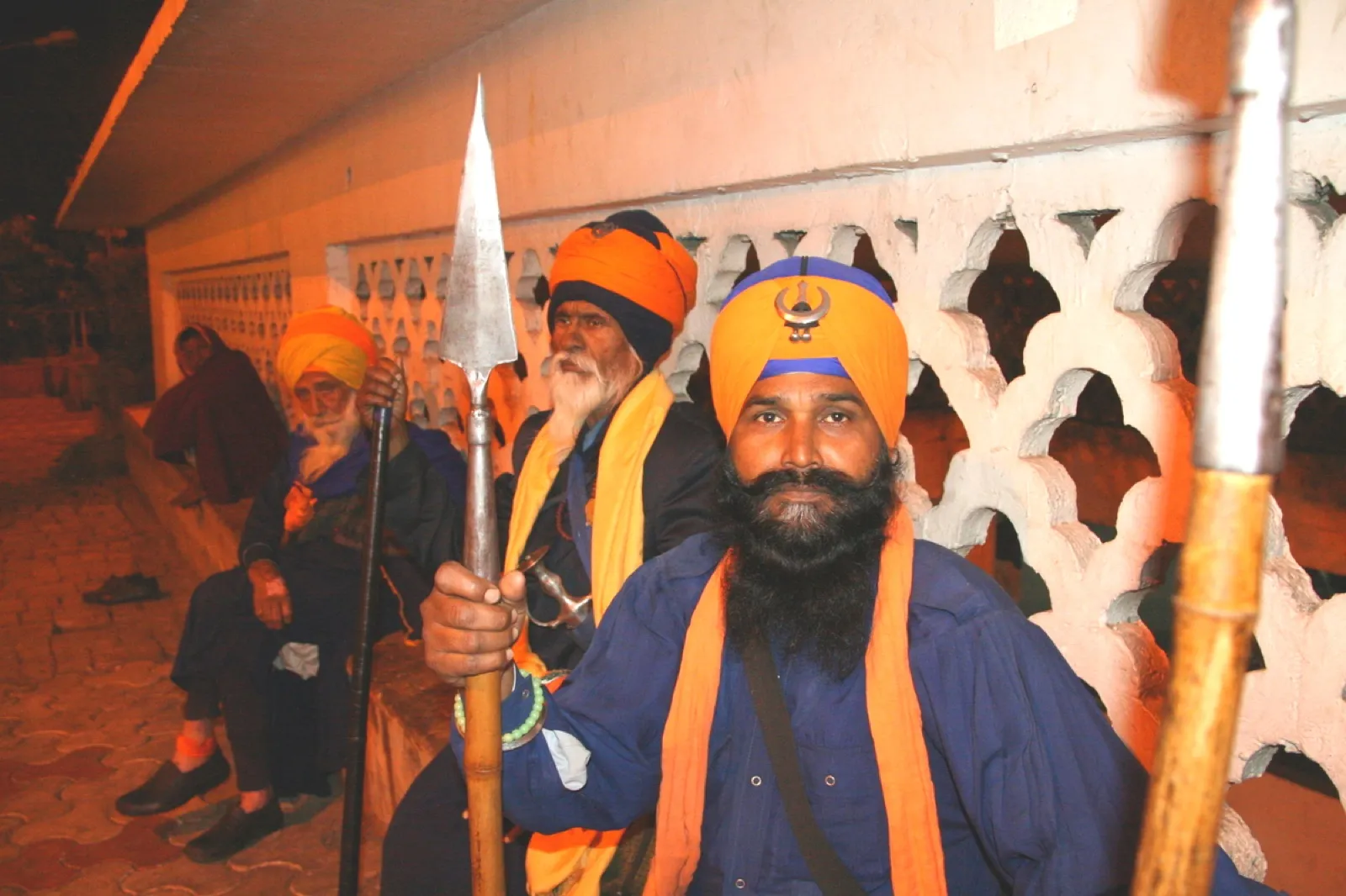 Nihang Sikhs in blue robes and tall turbans
